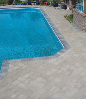 custom stone pool surround